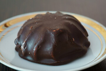 Marshmallow on a saucer close-up. Delicious sweets.