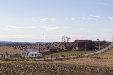 Fototapeta na wymiar Country Road Beside an Amish Farm and Schoolhouse | Holmes County, Ohio