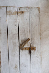 wooden door on old village house lock, village house door,