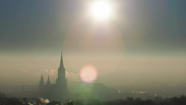 Colorful sunrise above city of Ulm with Ulm minster and Donaucenter time lapse