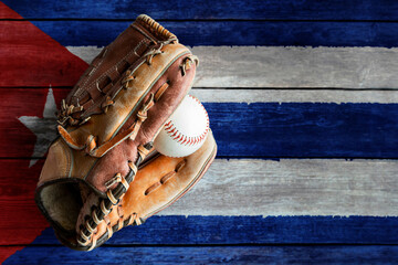 Leather Baseball Glove With Ball on Painted Cuban Flag. Cuba is one of the world's top baseball nations.