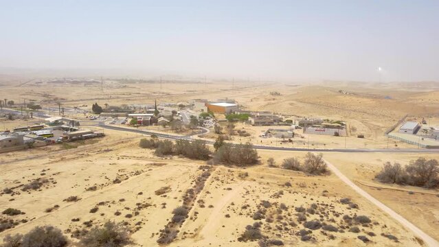 Flying forward to the administrative buildings in regional council Ramat Negev before a time of sand storm
