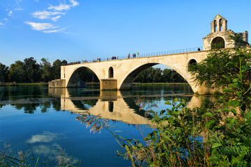Fototapeta na wymiar Scenic panorama of the Avignon Bridge and Chapel of Saint Nicholas
