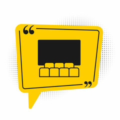 Black Cinema auditorium with screen icon isolated on white background. Yellow speech bubble symbol. Vector