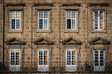 Fototapeta na wymiar Facade with eight windows in old building, a coruña, Spain