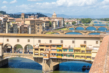 Florence, Italy - Circa June 2021: city landscape with Old Bridge - Ponte Vecchio.