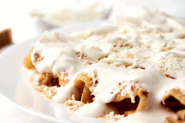 Enchiladas with cheese and cream, Veracruz style, mexican grastononomy