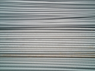 Closeup of concrete reinforcement steel rods in warehouse. Steel rods or bars used to reinforce...