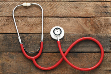 Stethoscope on wooden background. Heart health, health insurance concept, world heart day, world health day, world hypertension day