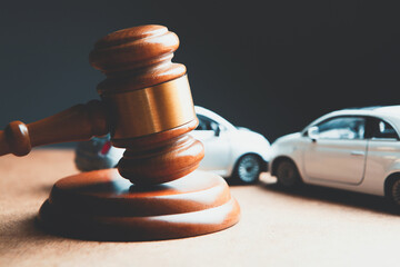 Fototapeta Model of car and gavel. Accident lawsuit or insurance, court case. obraz