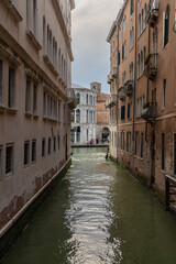 Fototapeta na wymiar Small Canal in Venice, Italy