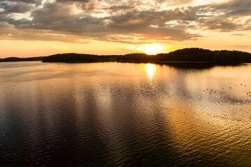 Beautiful sunset view of lake Galve, favourite among water-based tourists, divers and holiday makers, located in Trakai, Lithuania.