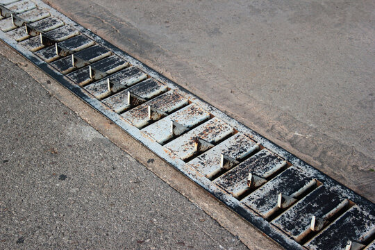 Traffic Spikes At The Entrance To A Parking Lot