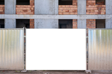 Blank white banner for advertisement mounted on the hoardin of construction site