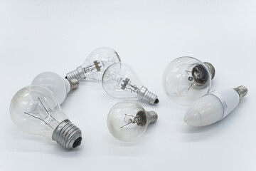 Different technology lamp light bulbs on white isolated background