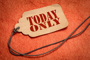 today only text on a paper price tag with a twine against textured bark paper, shopping and...
