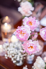 A small pink rose on the wedding Takasago