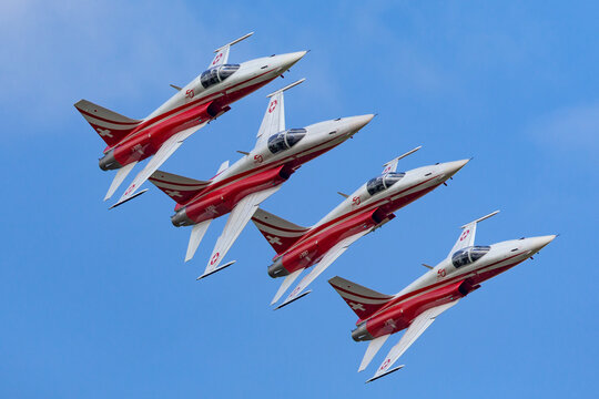 Payerne, Switzerland - September 1, 2014: Patrouille Suisse formation display team of the Swiss Air Force flying Northrop F-5E fighter aircraft.