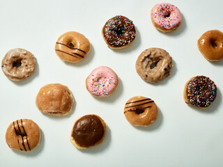 Colorful Assorted Glazed Donuts Flay Lay