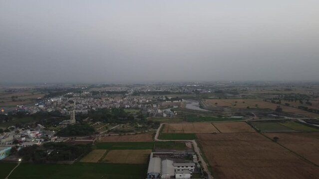 Beautiful aerial landscape at Kala Shah Kako Factory Industrial area of Punjab Pakistan at Sunset Time, drone's footage