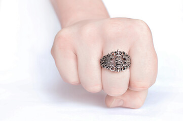Ring worn on the finger. Awesome metal accessory. Heavy metal stylish attribute. Rock style ring.