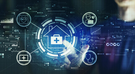 Telehealth theme with young man touching a digital screen at night