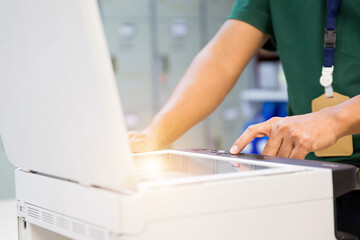 Copiers printer, Close up hand office man press copy button on panel to using the copier or...