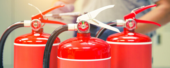Fire extinguisher has engineer inspection checking pressure gauges of fire extinguishers to prepare...