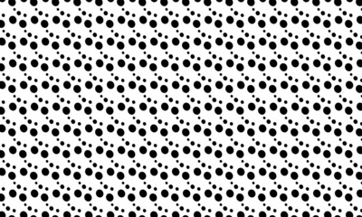 Simple seamless pattern in polka dot style. Black and white print for textiles. Brush strokes drawn in ink by hand. Vector illustration