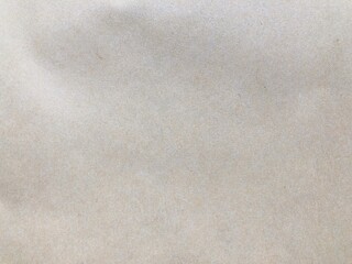Fototapeta na wymiar Kraft paper texture. Soft rough paper surface. Background for art work.