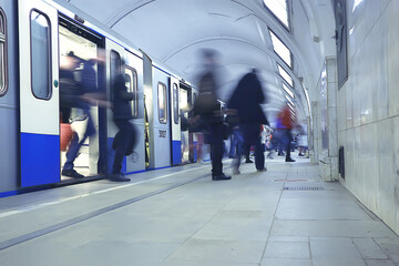 crowd of people metro in motion blurred, abstract background urban traffic people