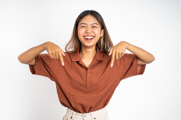 attractive asian woman with finger pointing down hand gesture on isolated background