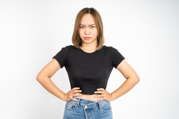 serious expression portrait of young asian woman over isolated background feeling uncertain