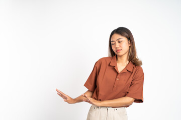 beautiful Young woman refusing with both palms gesture over isolated background