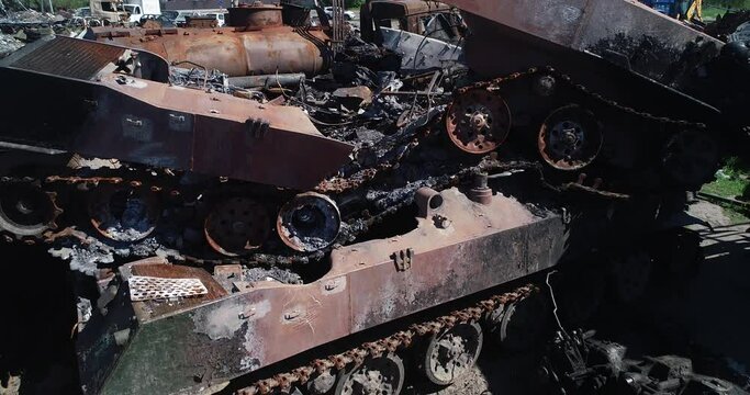 Burnt military equipment after a missile attack. Abandoned rusty military equipment. City of Irpin. Ukraine. War.