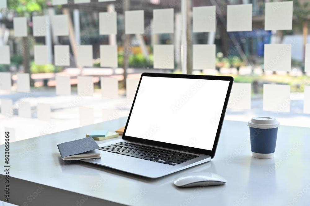 Poster laptop monitor with blank screen for your advertising text message and wireless mouse putting on whi
