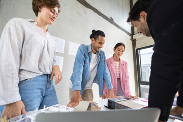 Engineer and architect discussing about blueprint layout design of electricity plan before construction. Teamwork site inspector and discuss together.