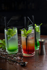 Three assorted cocktails at the bar 