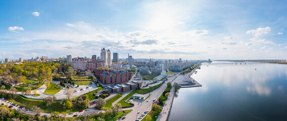 Panorama of the central part of the Dnipro city. Embankment of the Dnieper River. Residential and office buildings. View from above.