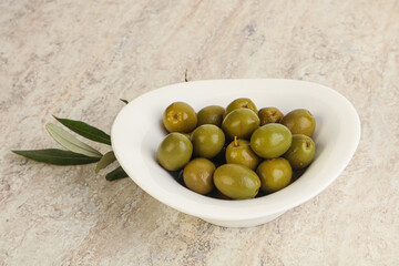 Tasty marinated olives in the bowl