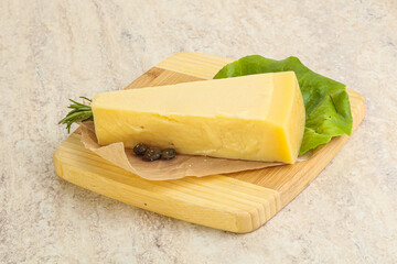 Traditional delicous Parmesan cheese over borad