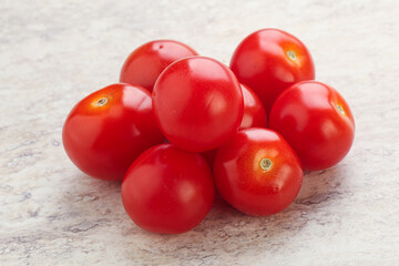 Ripe juicy cherry tomatoes heap