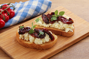 Bruschetta with soft cheese and tomato