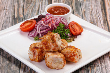 Chicken fillet skewer shashlik with sauce