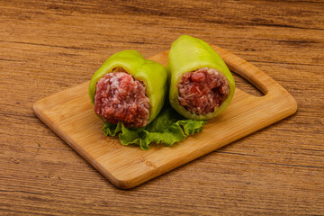 Raw stuffed bell pepper with meat