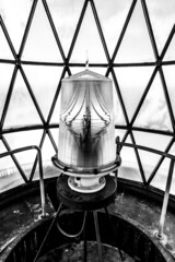 Vertical grayscale shot of the inside of Cape lighthouse in Florida