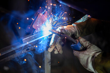 Metal welding. Fire from operation of welding machine. Manufacture of steel seam. Processing of...