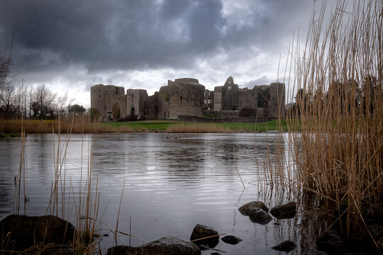 Beautiful lake in front of the old Roscommon Castle in Ireland on a gloomy day
