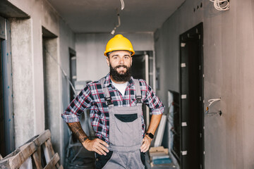 A handyman in a building in construction process.