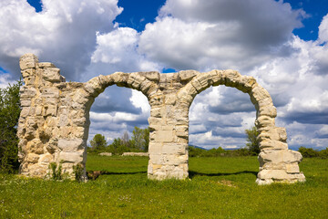 Fototapeta na wymiar The arches at Burnum, The ruins of the Roman arches at Burnum, Croatia